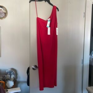 Beautiful red cocktail dress can dress up or down.